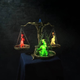 An image of a three-pronged scale with a red, yellow, and green flame.